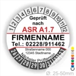 Prüfzertifikat gemäß ASR A1.7, inklusive Firmenname, Telefonnummer, Adresse und nächstem Prüftermin. Durchmesser von 25-50 mm, farbige Markierungen für die nächste Prüfung.
