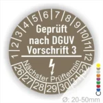 Prüfsiegel nach DGUV Vorschrift 3 für elektrische Geräte, zeigt den nächsten Prüftermin sowie einen Durchmesser von 20-50 mm.