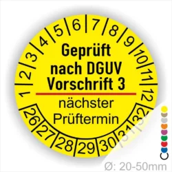 Gelbe DGUV Vorschrift 3 Prüfplakette rund mit Monats- und Jahresanzeige, Aufdruck „Geprüft nach DGUV Vorschrift 3“ und Feld für nächsten Prüftermin zur gesetzeskonformen Geräteprüfung