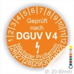 Prüfplakette rund mit Text geprüft nach DGUV V 4 danach Elektropfeil und Text Nächster Prüftermin. Plaketten Farbe- Orange und Text in Weiß. Monatszahlen oben und Jahreszahlen unten beginnend mit Startjahr- 26. Durchmesser 20-50mm frei wählbar.