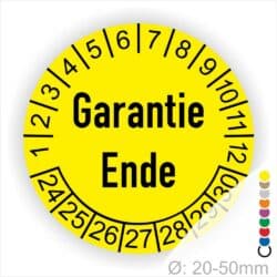 Prüfetiketten, Prüfaukleber rund, Farbe- Gelb, Text auf Englisch "Garantie Ende" in Schwarz. Startjahr- 24, Monatszahlen Oben und Jahreszahlen Unten in Kreisform.