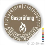 Brauen Gasprüfungslabel mit dem Text "Gasprüfung" und "Nächster Prüftermin" Kennzeichnung der nächsten Gasprüfung mit Feuer-Icon und Zahlen von 1 bis 12 Monatszahlen und 26-32 Jahreszahlen. Ideal für die Sicherheit von Gasinstallationen. Durchmesser 20-50 mm.