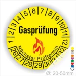 Gelbes Gasprüfungslabel mit dem Text "Gasprüfung" und "Nächster Prüftermin" Kennzeichnung der nächsten Gasprüfung mit Feuer-Icon und Zahlen von 1 bis 12 Monatszahlen und 26-32 Jahreszahlen. Ideal für die Sicherheit von Gasinstallationen. Durchmesser 20-50 mm.