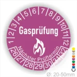 Rundes Prüfetikett für Gasprüfungen mit der Aufschrift "Gasprüfung" und dem Hinweis "Nächster Prüftermin". Das Etikett zeigt eine Feuer-Icon und ist für Durchmesser von 20-50 mm geeignet.