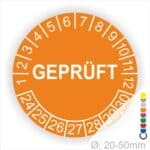 Prüfplakette rund, Farbe- Orange, Text "GEPRÜFT" in Weiß. Startjahr- 24, Monatszahlen Oben und Jahreszahlen Unten in Kreisform.