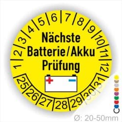 Batterie Akku Prüfung Prüfplaketten rund, Farbe- Gelb, Text "Nächste Batterie/Akku Prüfung" in Schwarz. Icon Batterie, Startjahr- 25, Monatszahlen Oben und Jahreszahlen Unten in Kreisform.