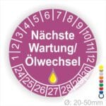 Prüfetiketten, Prüfaukleber rund, Farbe- Lila, Text "Nächste Wartung/Ölwechsel" in Weiß. Startjahr- 24, Monatszahlen Oben und Jahreszahlen Unten in Kreisform, über den Jahreszahlen ein Öltropfen als Icon/Piktogramm in Gelb.