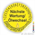 Prüfetiketten, Prüfaukleber rund, Farbe- Gelb, Text "Nächste Wartung/Ölwechsel" in Schwarz. Startjahr- 24, Monatszahlen Oben und Jahreszahlen Unten in Kreisform, über den Jahreszahlen ein Öltropfen als Icon/Piktogramm in Farbe Gelb.