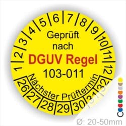 Prüfplakette, Wartungsticker runde Form mit Text geprüft nach DGUV Regel 103-011 Nächster Prüftermin. Plaketten Farbe- Gelb und Text in Schwarz und Rot. Monatszahlen oben und Jahreszahlen unten beginnend mit Startjahr- 26 zur Prüfung Elektrotechnik die BG Regel Arbeiten unter Spannung