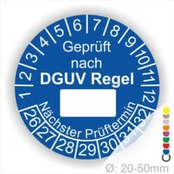 Prüfplakette rund mit Text geprüft nach DGUV Regel danach Beschriftungsfeld in Weiß und Text Nächster Prüftermin. Plaketten Farbe- Blau und Text in Weiß. Monatszahlen oben und Jahreszahlen unten beginnend mit Startjahr- 26. Durchmesser 20-50mm frei wählbar.