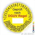 Prüfplakette rund mit Text geprüft nach DGUV Regel danach Beschriftungsfeld in Weiß und Text Nächster Prüftermin. Plaketten Farbe- Gelb und Text in Schwarz. Monatszahlen oben und Jahreszahlen unten beginnend mit Startjahr- 26. Durchmesser 20-50mm frei wählbar.