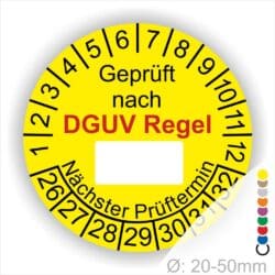Prüfplakette rund mit Text geprüft nach DGUV Regel danach Beschriftungsfeld in Weiß und Text Nächster Prüftermin. Plaketten Farbe- Gelb und Text in Schwarz. Monatszahlen oben und Jahreszahlen unten beginnend mit Startjahr- 26. Durchmesser 20-50mm frei wählbar.