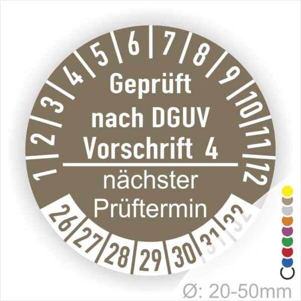 Prüfplakette mit Text Geprüft nach Dguv Vorschrift 4 und Nächster Prüftermin mit zwischen Strich in Weiss. Plaketten Farbe- Braun und Text in Weiss. Monatszahlen oben und Jahreszahlen unten beginnend mit Startjahr- 26