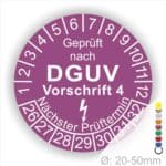 Prüfplakette rund mit Text geprüft nach Dguv Vorschrift 3 danach Elektropfeilund Text Nächster Prüftermin. Plaketten Farbe- Lila und Text in Weiß. Monatszahlen oben und Jahreszahlen unten beginnend mit Startjahr- 26.