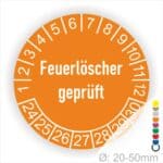 Prüfetiketten, Prüfaukleber rund, Farbe- Orange, Text auf Englisch "Feuerlöscher geprüft" in Weiß. Startjahr- 24, Monatszahlen Oben und Jahreszahlen Unten in Kreisform.