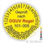 Prüfplakette, Mehrjahresplakette runde Form mit Text geprüft nach DGUV Regel 101-005 Nächster Prüftermin. Plaketten Farbe- Gelb und Text in Schwarz und Rot. Monatszahlen oben und Jahreszahlen unten beginnend mit Startjahr- 26 zur Prüfung von Hochziehbare Personenaufnahmemittel