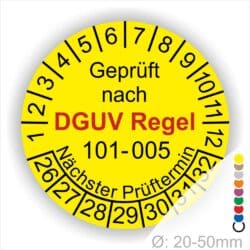 Prüfplakette, Mehrjahresplakette runde Form mit Text geprüft nach DGUV Regel 101-005 Nächster Prüftermin. Plaketten Farbe- Gelb und Text in Schwarz und Rot. Monatszahlen oben und Jahreszahlen unten beginnend mit Startjahr- 26 zur Prüfung von Hochziehbare Personenaufnahmemittel