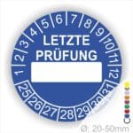 Prüfplaketten, rund, Farbe- Blau, Text "LETZTE PRÜFUNG" in Weiß. Als nächstes kommt ein Beschriftungfeld / Leerfeld in Farbe Weiß. Startjahr- 25, Monatszahlen Oben und Jahreszahlen Unten in Kreisform in Weiß.