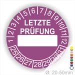 Prüfplaketten, rund, Farbe- Lila, Text "LETZTE PRÜFUNG" in Weiß. Als nächstes kommt ein Beschriftungfeld / Leerfeld in Farbe Weiß. Startjahr- 25, Monatszahlen Oben und Jahreszahlen Unten in Kreisform in Weiß.
