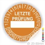 Prüfplaketten, rund, Farbe- Orange, Text "LETZTE PRÜFUNG" in Weiß. Als nächstes kommt ein Beschriftungfeld / Leerfeld in Farbe Weiß. Startjahr- 25, Monatszahlen Oben und Jahreszahlen Unten in Kreisform in Weiß.