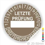 Braun Prüfaufkleber mit der Aufschrift "LETZTE PRÜFUNG" und Platz für das Datum. Der Aufkleber zeigt Zahlen von 1 bis 12 und von 26 bis 32. Durchmesser von 20-50 mm, geeignet für regelmäßige Sicherheitsüberprüfungen.