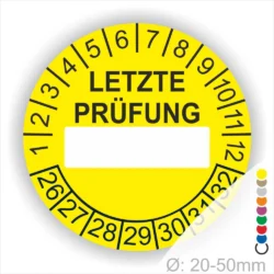 Prüfplakette, rund, Farbe- Gelb, Text "LETZTE PRÜFUNG" in Schwarz. Als nächstes kommt ein Beschriftung Feld / Leer Feld in Farbe Weiß. Startjahr- 26, Monatszahlen Oben und Jahreszahlen Unten in Kreisform in Schwarz.