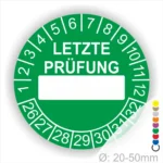 Gruen Prüfaufkleber mit der Aufschrift "LETZTE PRÜFUNG" und Platz für das Datum. Der Aufkleber zeigt Zahlen von 1 bis 12 und von 26 bis 32. Durchmesser von 20-50 mm, geeignet für regelmäßige Sicherheitsüberprüfungen.