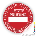 Rot Prüfaufkleber mit der Aufschrift "LETZTE PRÜFUNG" und Platz für das Datum. Der Aufkleber zeigt Zahlen von 1 bis 12 und von 26 bis 32. Durchmesser von 20-50 mm, geeignet für regelmäßige Sicherheitsüberprüfungen.