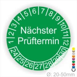 Prüfplakette mit Text Nächster Prüftermin Startjahr- 26, Monatszahlen Oben und Jahreszahlen Unten in Kreisform. Farbe Gruen