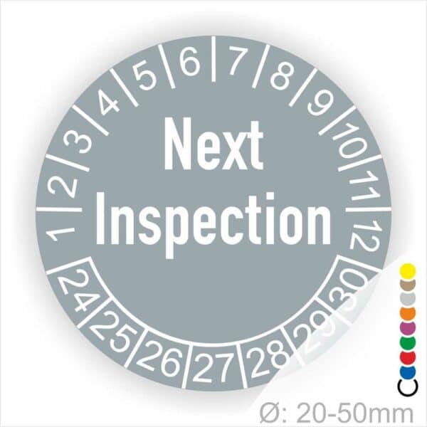 Prüfplaketten, Prüfetiketten rund, Farbe- Grau, Text auf Englisch "Next Inspection" in Weiß. Startjahr- 24, Monatszahlen Oben und Jahreszahlen Unten in Kreisform.