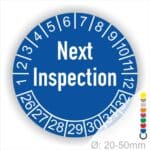 Prüfplaketten, Prüfetiketten rund, Farbe- Blau, Text auf Englisch "Next Inspection" in Weiß. Startjahr- 26, Monatszahlen Oben und Jahreszahlen Unten in Kreisform.