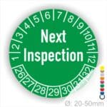 Prüfplaketten, Prüfetiketten rund, Farbe- Grün, Text auf Englisch "Next Inspection" in Weiß. Startjahr- 26, Monatszahlen Oben und Jahreszahlen Unten in Kreisform.
