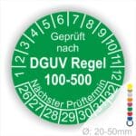 Prüfplakette rund mit Text geprüft nach DGUV Regel 100-500 Nächster Prüftermin. Plaketten Farbe- Grün und Text in Weiß. Monatszahlen oben und Jahreszahlen unten beginnend mit Startjahr- 26
