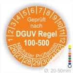 Prüfplakette rund mit Text geprüft nach DGUV Regel 100-500 Nächster Prüftermin. Plaketten Farbe- Orange und Text in Weiß. Monatszahlen oben und Jahreszahlen unten beginnend mit Startjahr- 26. Durchmesser 20-50mm frei wählbar.