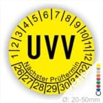Prüfplaketten rund, Farbe- Gelb, Text "UVV" in Schwarz. Startjahr- 26, Monatszahlen Oben und Jahreszahlen Unten in Kreisform über den Jahreszahlen Text "Nächster Prüftermin"