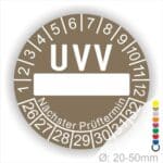 Prüfplaketten, rund, Farbe- Braun, Text "UVV Nächster Prüftermin" in Weiß. Als nächstes kommt ein Beschriftungfeld / Leerfeld in Farbe Weiß. Startjahr- 26, Monatszahlen Oben und Jahreszahlen Unten in Kreisform. über den Jahreszahlen Text "Nächster Prüftermin" Die Prüfplakette wird verwendet zur Prüfung von Anlagen & Maschine
