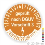Rundes Prüfzeichen in Orange mit der Aufschrift "geprüft nach DGUV Vorschrift 3" und einer Zahlenreihe von 1 bis 32, geeignet für Geräte mit einem Durchmesser von 20-50 mm.