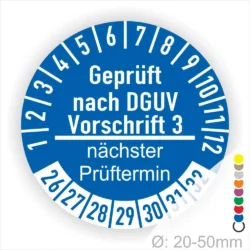Prüfzettel gemäß DGUV Vorschrift 3 in blauer Farbe mit Angaben zum nächsten Prüftermin und einem Durchmesser von 20-50 mm.