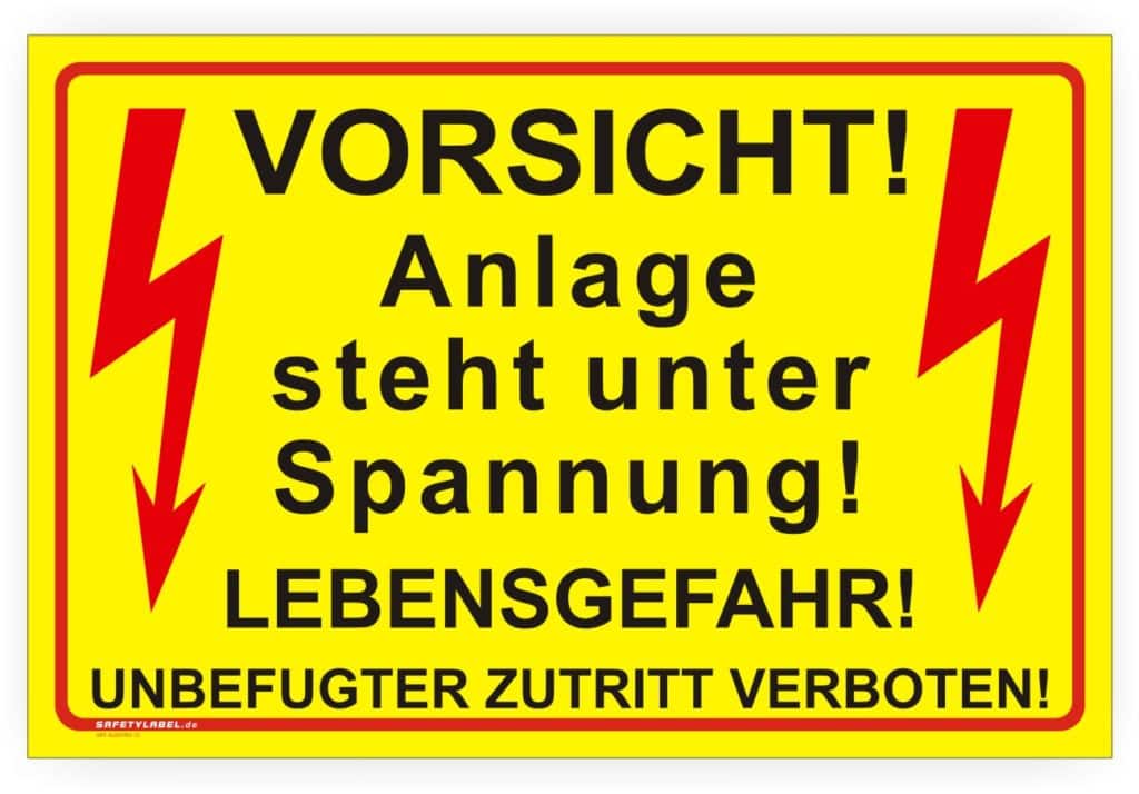 Hinweisschild Prüffeld! Vorsicht! Hier führen auch ungeschützte Teile