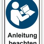 Symbol mit einer Person, die eine Anleitung liest, und dem Hinweis "Anleitung beachten". Ideal für Sicherheitshinweise oder Bedienungsanleitungen.