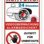 Sicherheitsschild mit Hinweis auf 24-Stunden-Videobeobachtung und Alarmgesichertheit, sowie Verbot des Zugangs für Unbefugte.