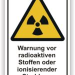 Warnschild mit dem Hinweis auf radioaktive Stoffe oder ionisierende Strahlung, gelbes Dreieck mit Symbol.