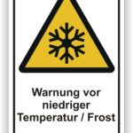 Warnschild mit gelbem Dreieck und Schneeflocken-Symbol, das vor niedrigen Temperaturen und Frost warnt.