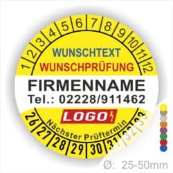 Gelbe Prüfplakette mit Monats- und Jahresring zur Kennzeichnung des nächsten Prüftermins. In der Mitte befindet sich Platz für Firmenname, Telefonnummer, Wunschtext und Logo. Selbstklebend, personalisierbar, erhältlich in 25–50 mm.