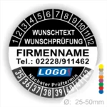 Schwarz Prüfplakette mit Monats- und Jahresring zur Kennzeichnung des nächsten Prüftermins. In der Mitte befindet sich Platz für Firmenname, Telefonnummer, Wunschtext und Logo. Selbstklebend, personalisierbar, erhältlich in 25–50 mm.