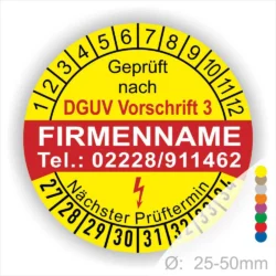 Prüfsiegel nach DGUV Vorschrift 3, gelbe runde Plakette mit Firmennamen und Kontaktnummer, nächster Prüftermin markiert, Durchmesser 25-50 mm.