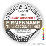 Alt-Text: Prüfplakette mit Angaben zur DGUV Vorschrift 3, Firmenname, Telefonnummer, Adresse, nächster Prüftermin und Durchmesser von 25-50mm.