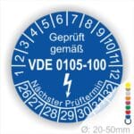 Prüfplaketten rund, Text "geprüft gemäß VDE 0105-100" Farbe- Blau Startjahr- 26 mit Elektro Pfeil, Monatszahlen Oben und Jahreszahlen Unten DIN VDE 0105 Prüfplaketten