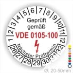 DIN VDE 0105 Prüfplakette rund, Text "geprüft gemäß VDE 0105-100" Farbe- Weiß Startjahr- 26 mit Elektro Pfeil, Monatszahlen Oben und Jahreszahlen Unten
