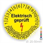 Prüfplaketten rund, Text "Elektrisch geprüft" Farbe- Gelb Startjahr- 26 mit Elektro Pfeil in Rot, Monatszahlen Oben und Jahreszahlen Unten in Kreisform